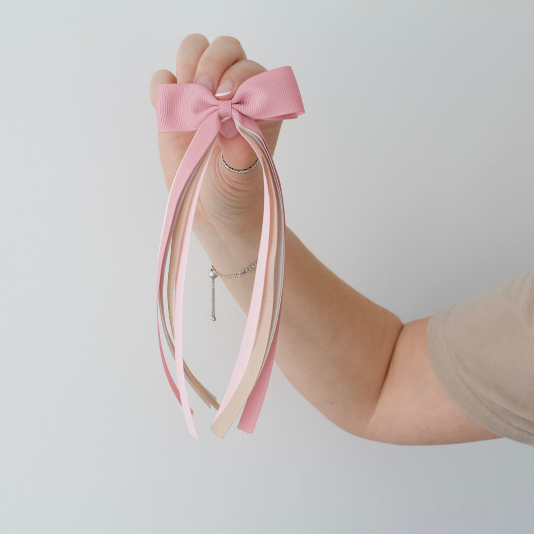 Large neutral tail pinch ribbon bows