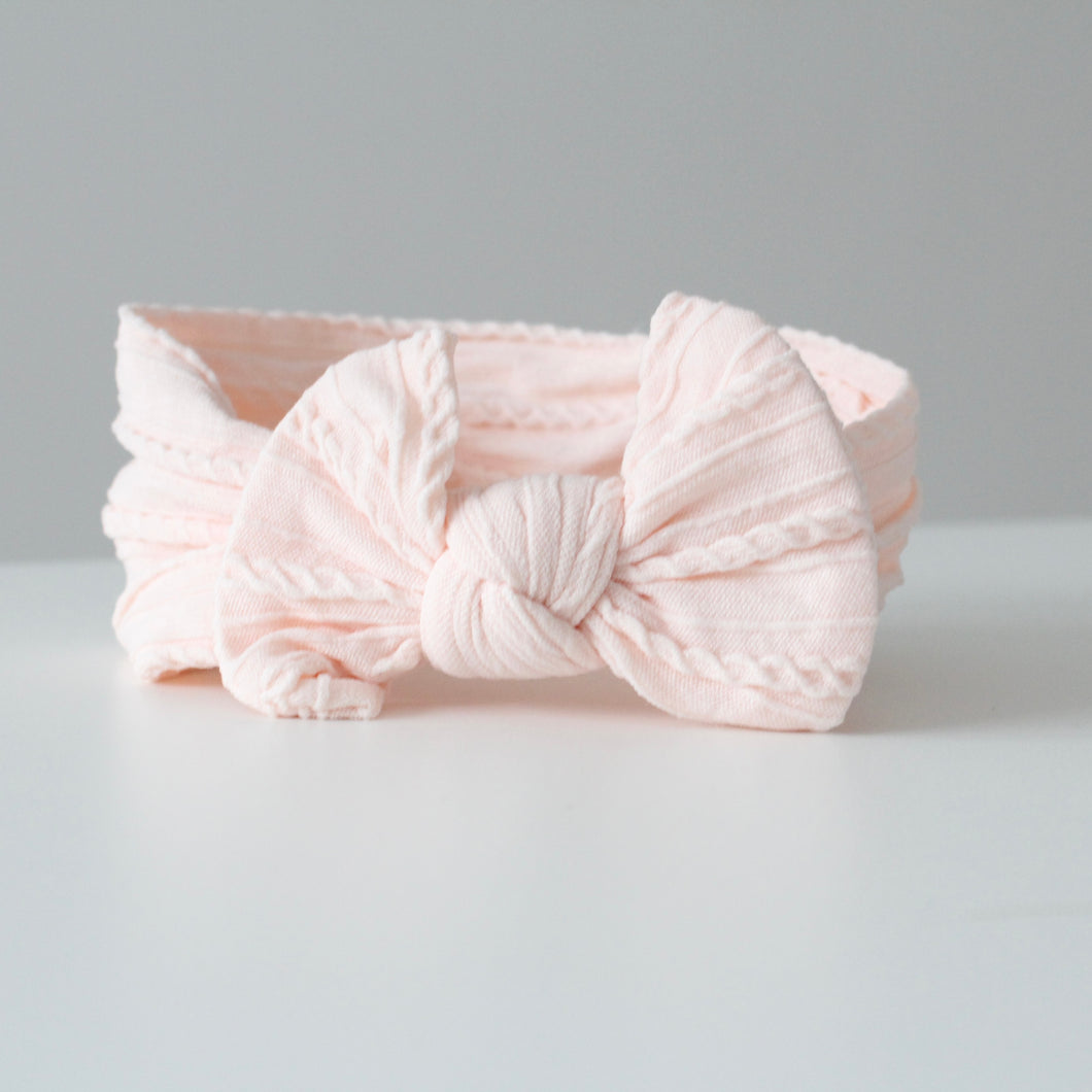 Soft peach cable headwrap